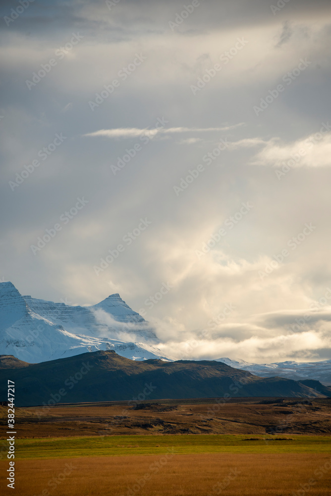 Sunset over Cloudy Snowy Mountains Sunset over Cloudy Snowy Mountains