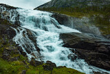 Nyastolfossen falls, second in cascade of four waterfalls in Husedalen valley, Kinsarvik, Norway