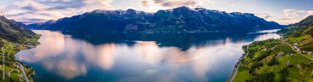 Apple farms in Sorfjorden, lake and mountains, Norway