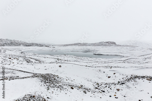  Glacial pools in snowy highland, Iceland
