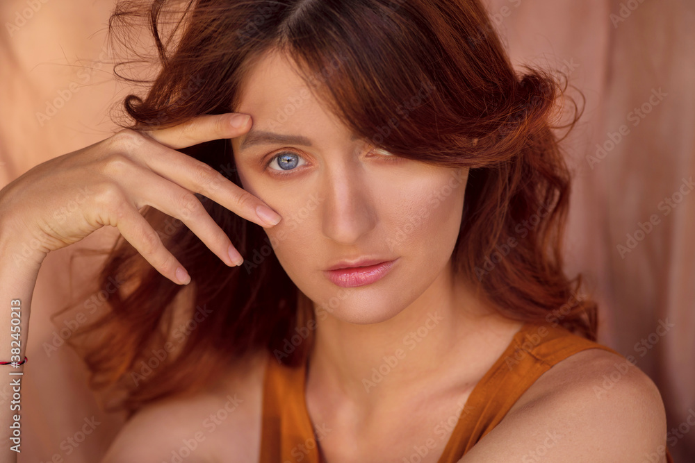 portrait beautiful of a red-haired girl with blue eyes.close up portrait beautiful of a red-haired girl with blue eyes.close up