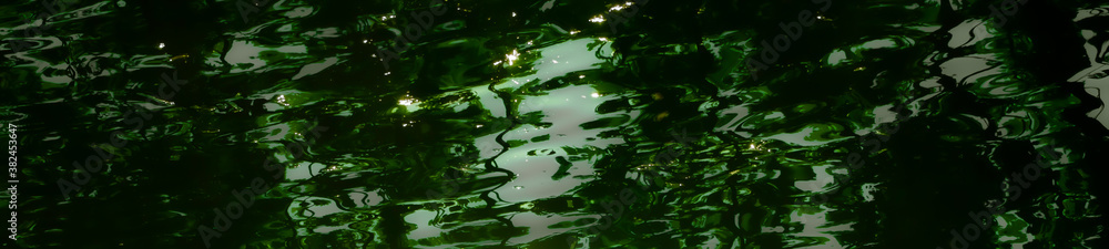 the sun is reflected in the water
the sun is reflected in the water