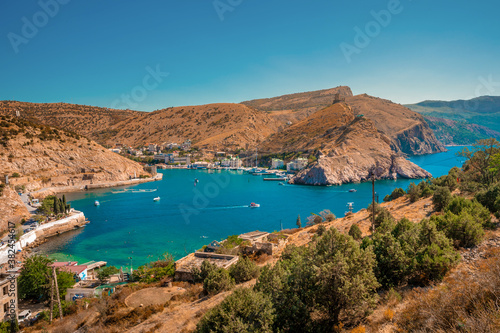Fototapeta Naklejka Na Ścianę i Meble -  Picturesque panoramic view of Balaklava bay with yachts and green hills. Sevastopol, Crimea.