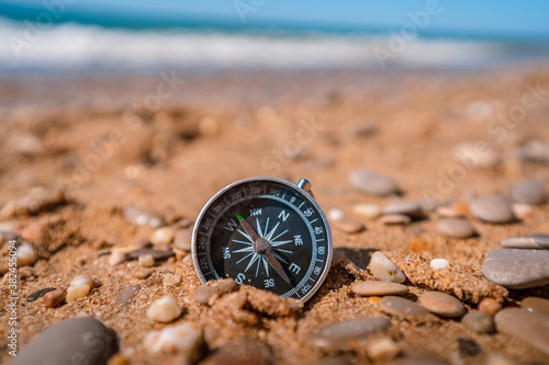 compass, direction, north, travel, east, west, south, navigation, macro, isolated, equipment, orientation, texture, closeup, concept, rock, map, hiking, nature, sand, beach, sea, ocean, water, sky, jo