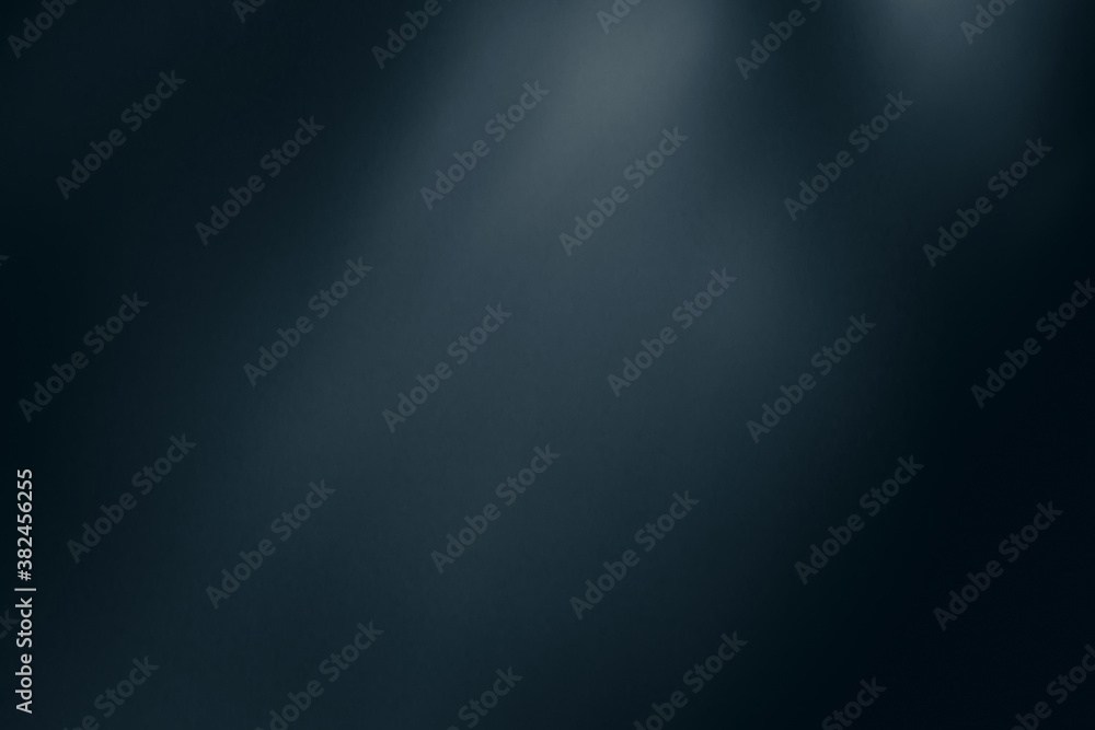 Blurred abstract colored dark blue light spots background.