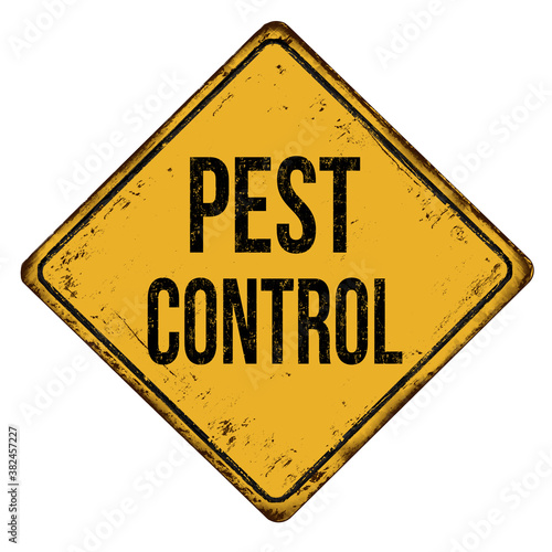 Pest control vintage rusty metal sign