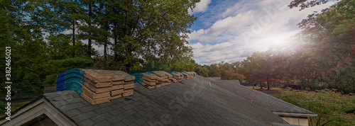 Принти на полотні Shingle Bundles Stacked on Roof to Repair Storm Weather Damage