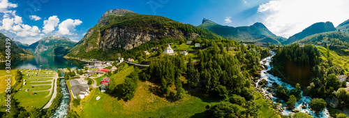 View of the river Geirangerelvi and the waterfall Storfossen in Geiranger, Norway. photo