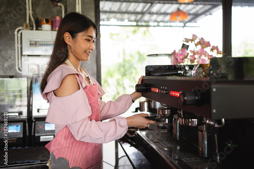Startup new business concept. Portrait of Asian female working in her coffee shop
