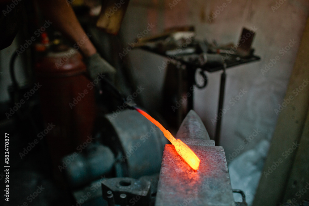 Men working with metal Men working with metal