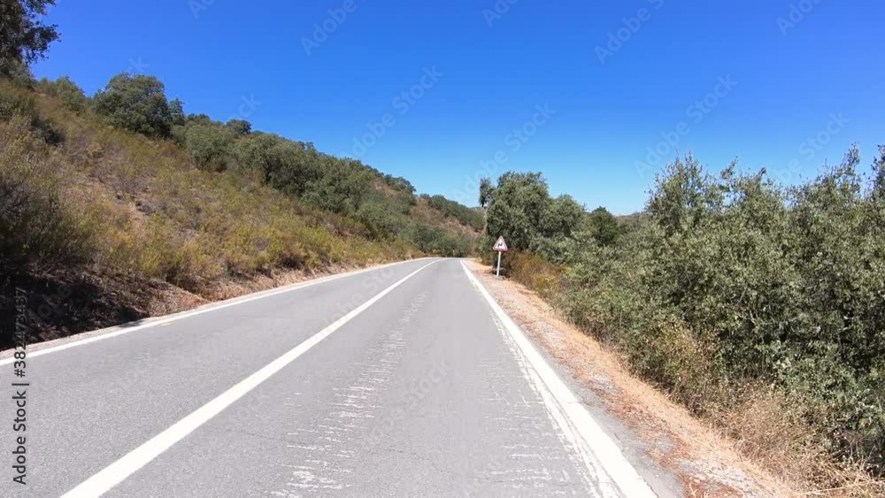 dolly move forward - EM507 paved road beside the Guadiana River next to Alcoutim, Algarve, Portugal dolly move forward - EM507 paved road beside the Guadiana River next to Alcoutim, Algarve, Portugal