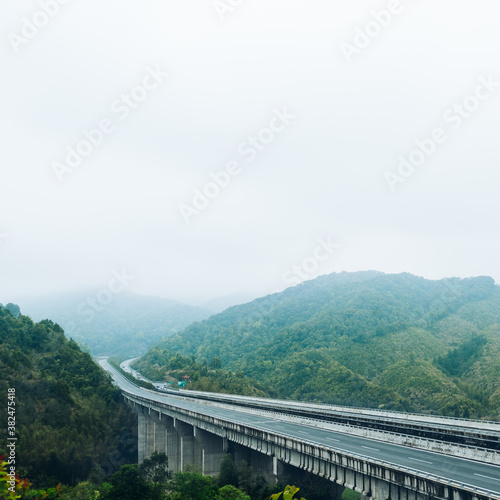 elevated highway admist mountains photo