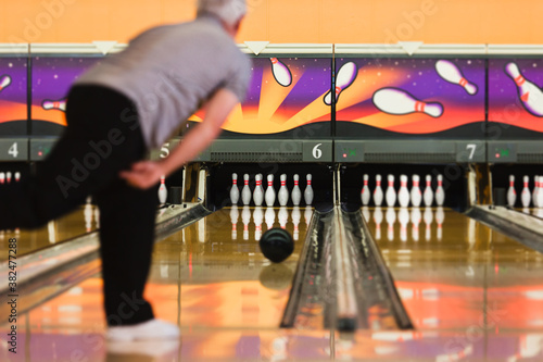 Bowling: Mature Bowler Just Released Ball Down Alley