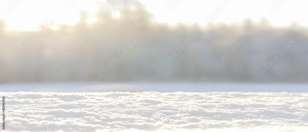 Fototapeta premium Christmas winter blurred background with snow.Banner for winter projects.