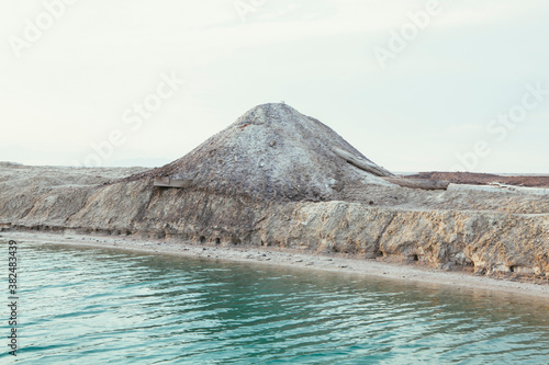 Canal and gravel pile from chloride mine, near Wendover, UT photo