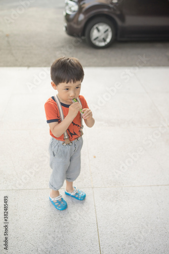 Boy eating jelly lollies photo