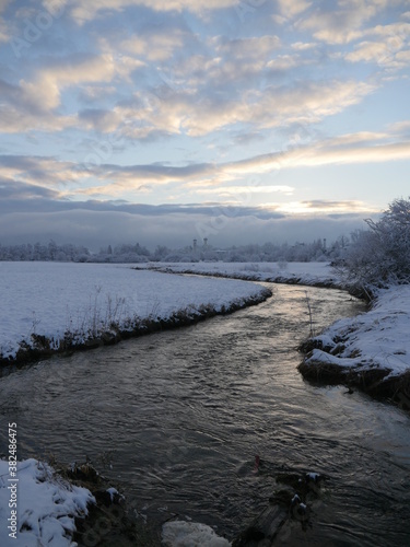 Wild river in winter landscape photo