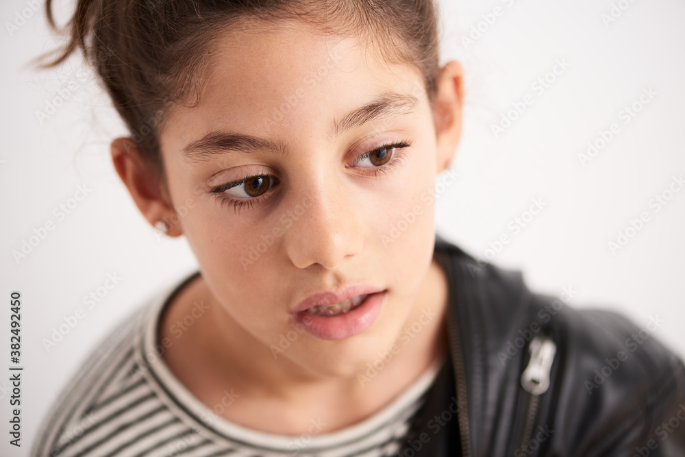 Pensive teen girl with open lips looking away Pensive teen girl with open lips looking away