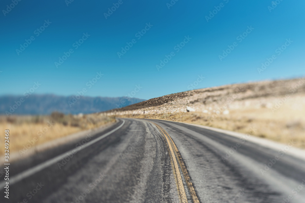 The highway road on Antelope Island, Utah The highway road on Antelope Island, Utah