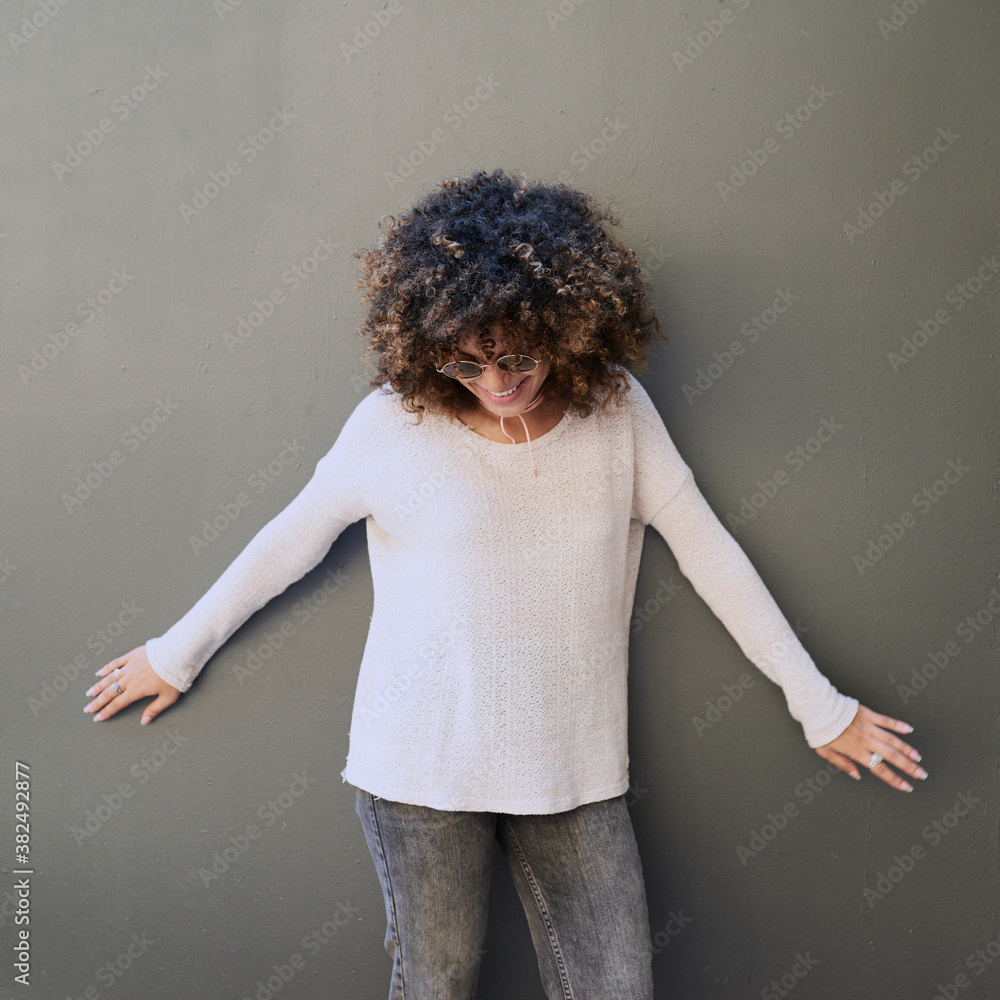 Mixed race with afro in round sunglasses in white long sleeve Mixed race with afro in round sunglasses in white long sleeve