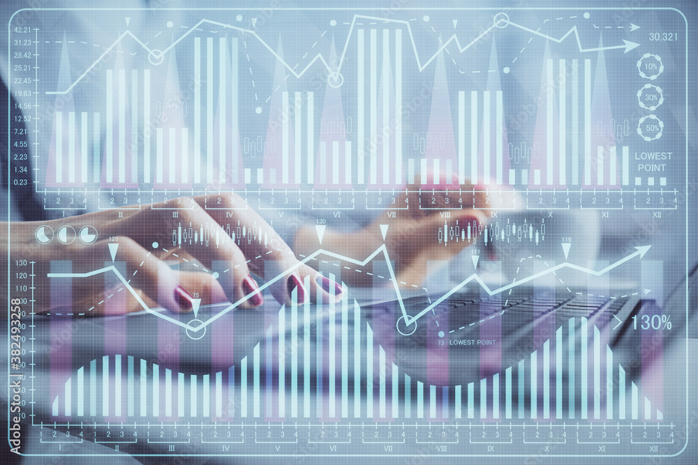 Multi exposure of woman hands typing on computer and financial graph hologram drawing. Stock market analysis concept. Multi exposure of woman hands typing on computer and financial graph hologram drawing. Stock market analysis concept.