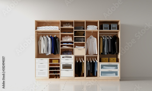 Photo Big wardrobe with different clothes for dressing room