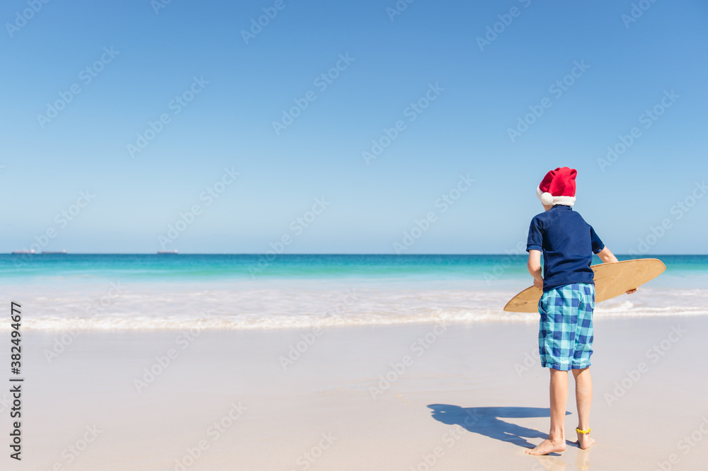 Skim boarding at the beach on Christmas morning Skim boarding at the beach on Christmas morning