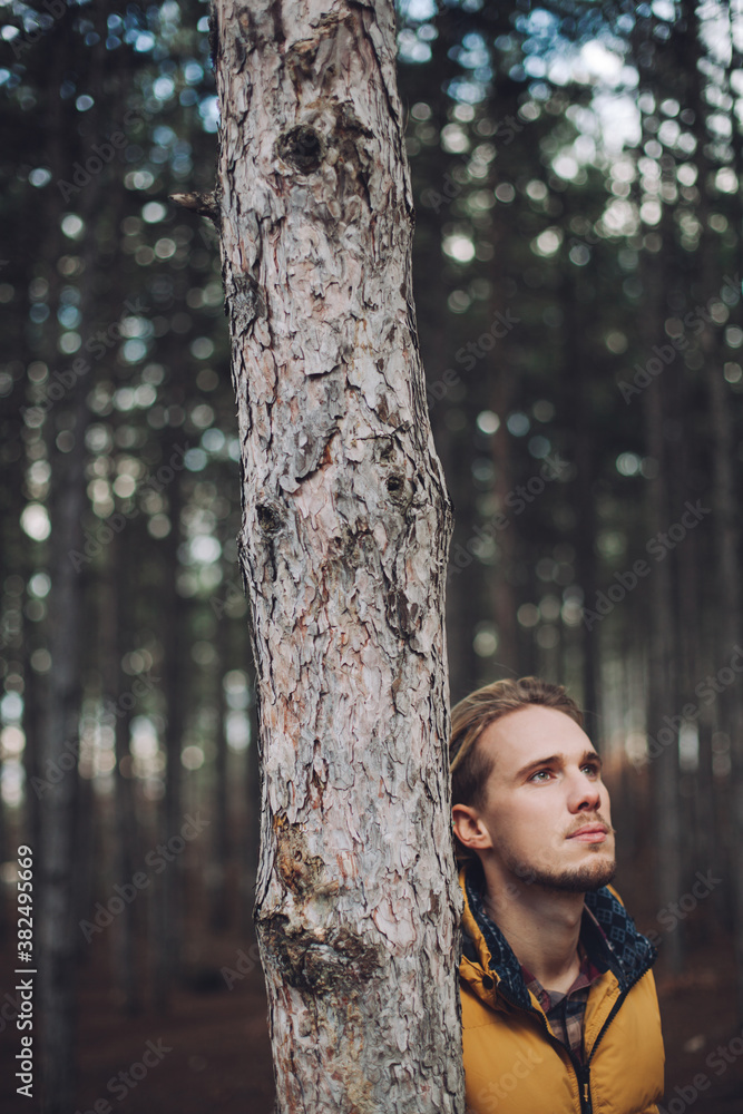 Young Man Standing in the Woods Young Man Standing in the Woods