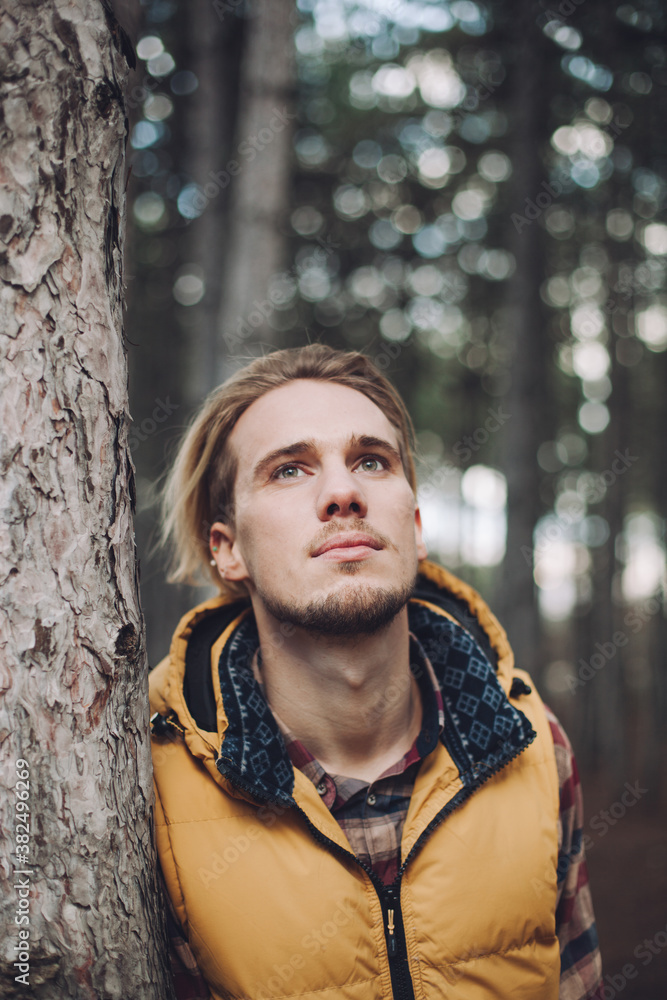Handsome Man Standing in the Woods Handsome Man Standing in the Woods