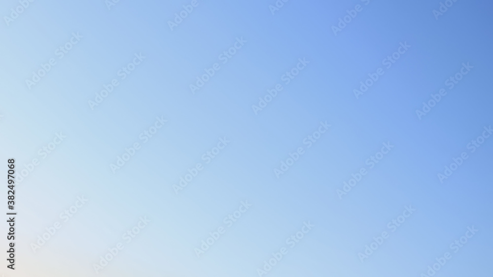 sky background captured in the morning, sky view in blue natural colors with gradient, sky texture without clouds, black, atmosphere, space colors, defocus