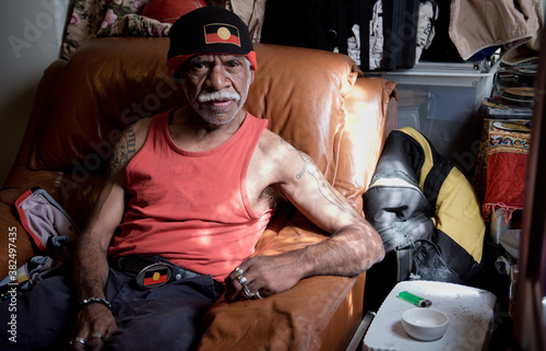 Aboriginal Elder Seated in an Armchair photo