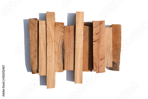A row of wood on a white background