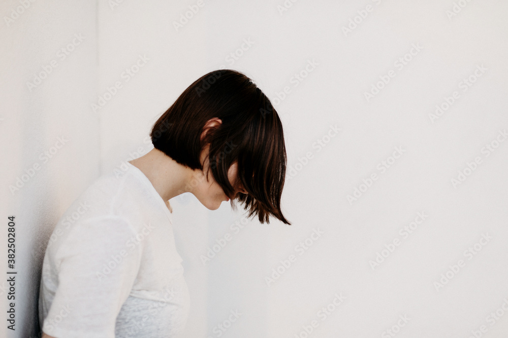 Girl with white shirt tucked in black jeans Girl with white shirt tucked in black jeans