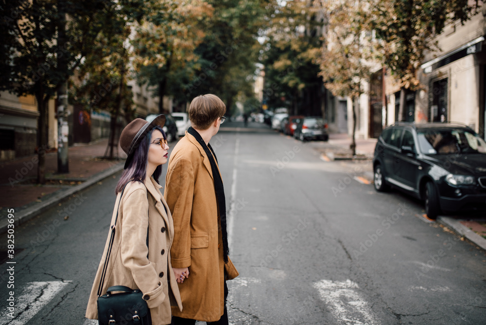 Young beautiful couple walking outdoors Young beautiful couple walking outdoors