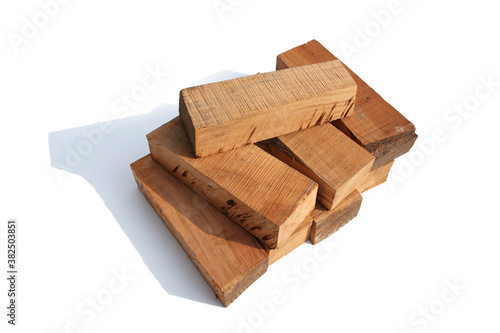 A pile of wood blocks on a white background