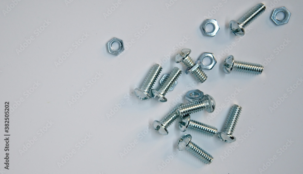Overhead View of Some Shiny Nuts and Bolts Overhead View of Some Shiny Nuts and Bolts