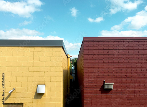 Crop of two different colorful buildings. photo