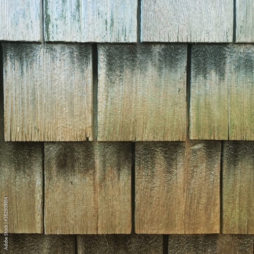 worn cedar shingles on a house