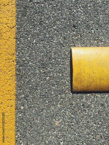 Close up of speed bump obstacle on urban street photo