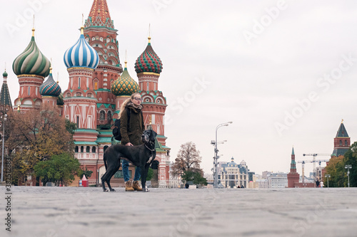 Woman with dog. Red Square