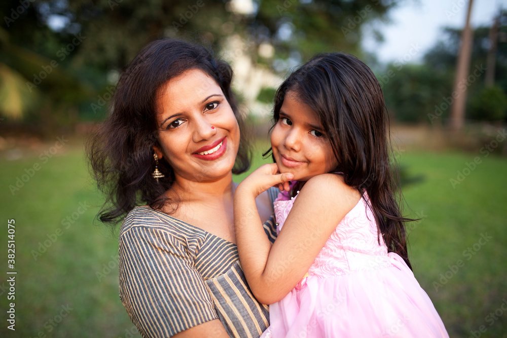 Happy Mother and kid interacting with each other Happy Mother and kid interacting with each other