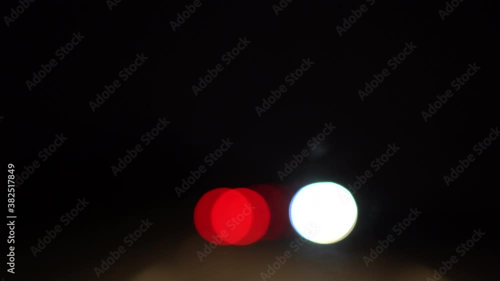 Colorful bokeh lights through car window Colorful bokeh lights through car window