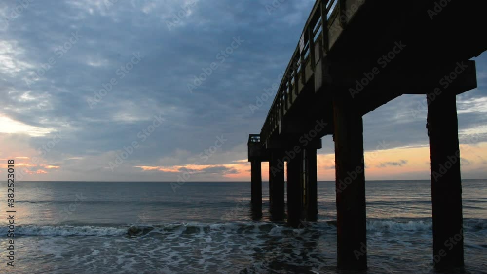 St. Augustine Pier wide sunset at the beach St. Augustine Pier wide sunset at the beach