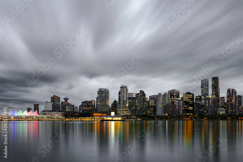 Dramatic night skyline with reflection of Vancouver Downtown as seen from Stanley Park, British Columbia, Canada © Jara