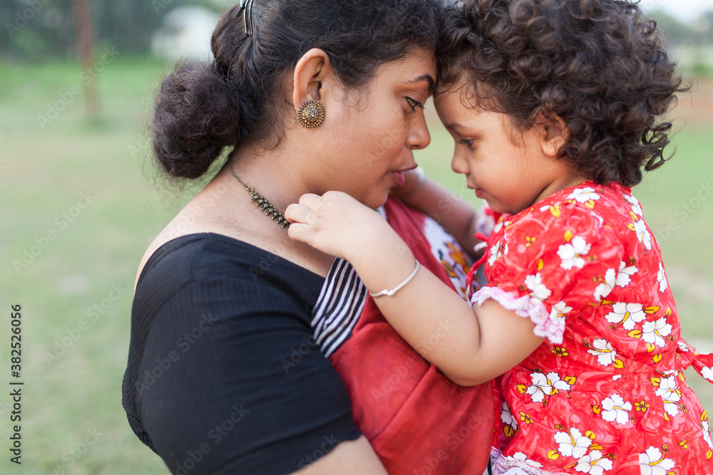 Mother and cute daughter at outdoors Mother and cute daughter at outdoors