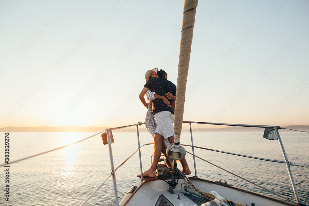 Lovely mature couple on sailboat. Lovely mature couple on sailboat.