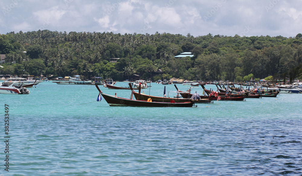 Idyllic crystal seawater in front of luxury hotel, attractive clear sea, nature coastline backgrounds during holidays, wave from clear blue green sea and fine sand Phuket Thailand toursim advertisemen Idyllic crystal seawater in front of luxury hotel, attractive clear sea, nature coastline backgrounds during holidays, wave from clear blue green sea and fine sand Phuket Thailand toursim advertisemen
