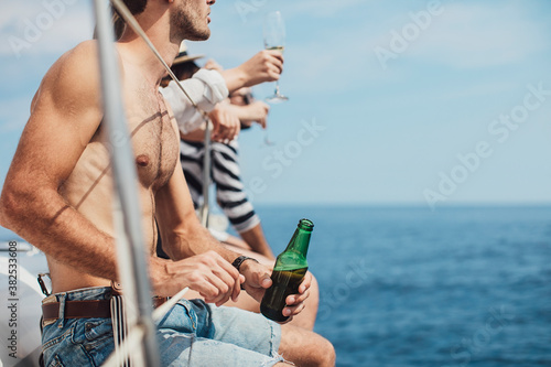 People Enjoying Summertime on Silboat photo