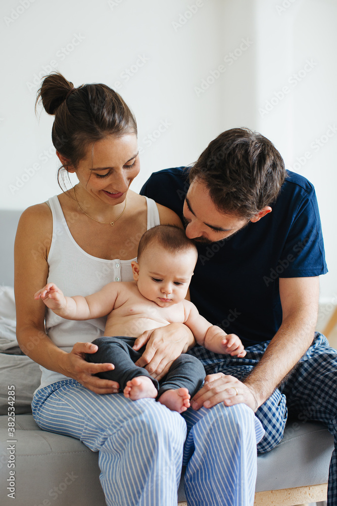 Happy family having fun with his baby boy at home. Happy family having fun with his baby boy at home.