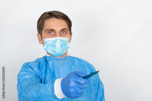 Young male doctor with scrubs